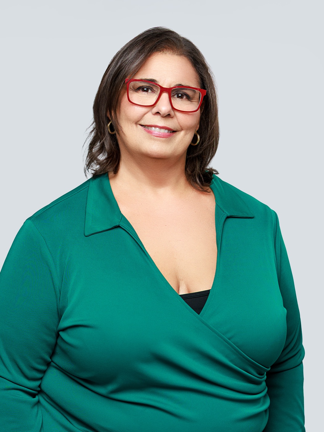 Stacie Dumas laughing, in green